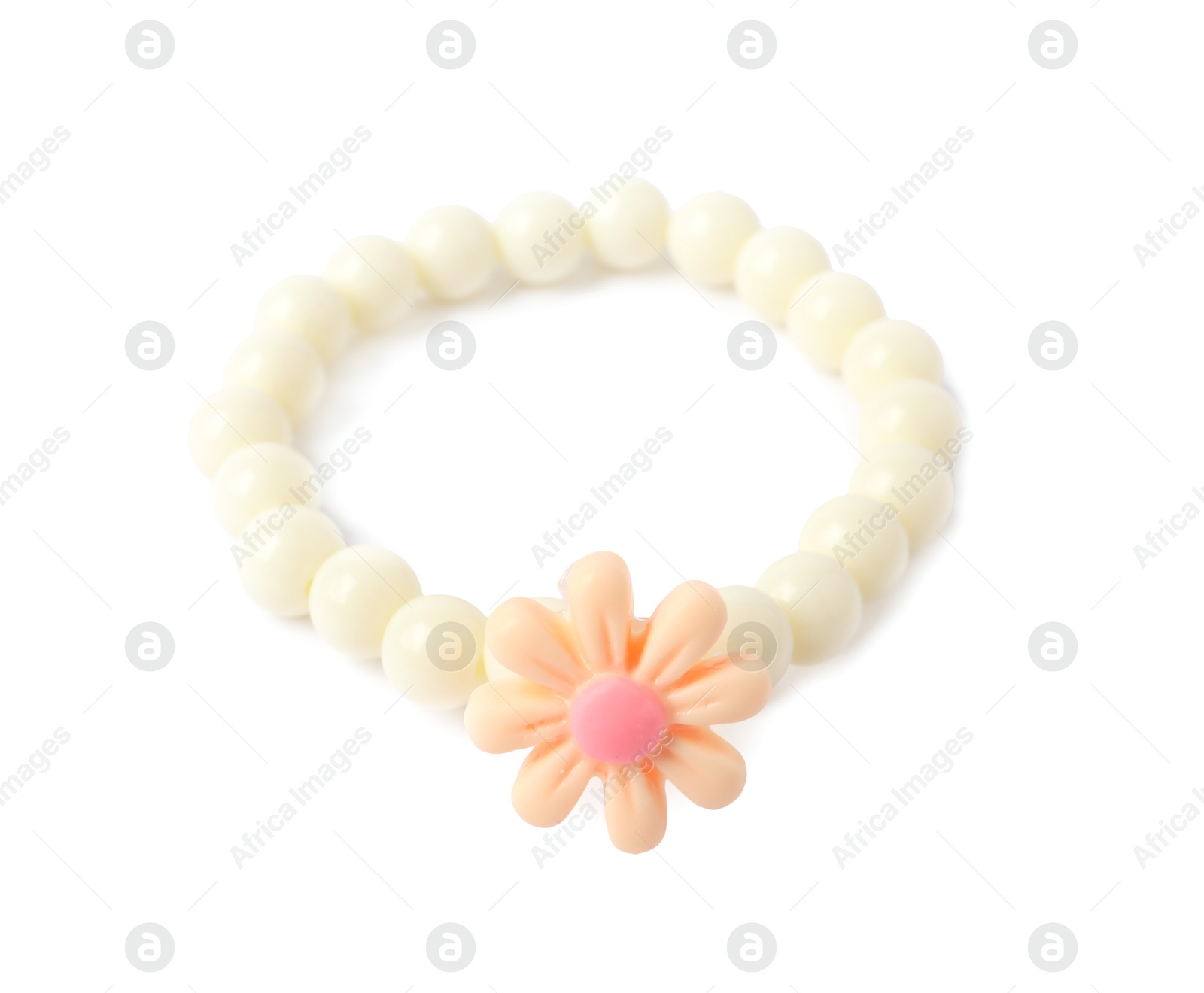 Photo of One beige hair tie with flower isolated on white