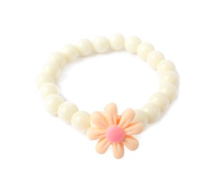 Photo of One beige hair tie with flower isolated on white