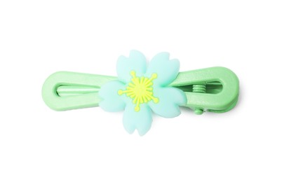 Photo of Cute hair clip with flower isolated on white, top view