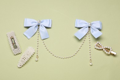 Photo of Cute hair accessories on color background, flat lay