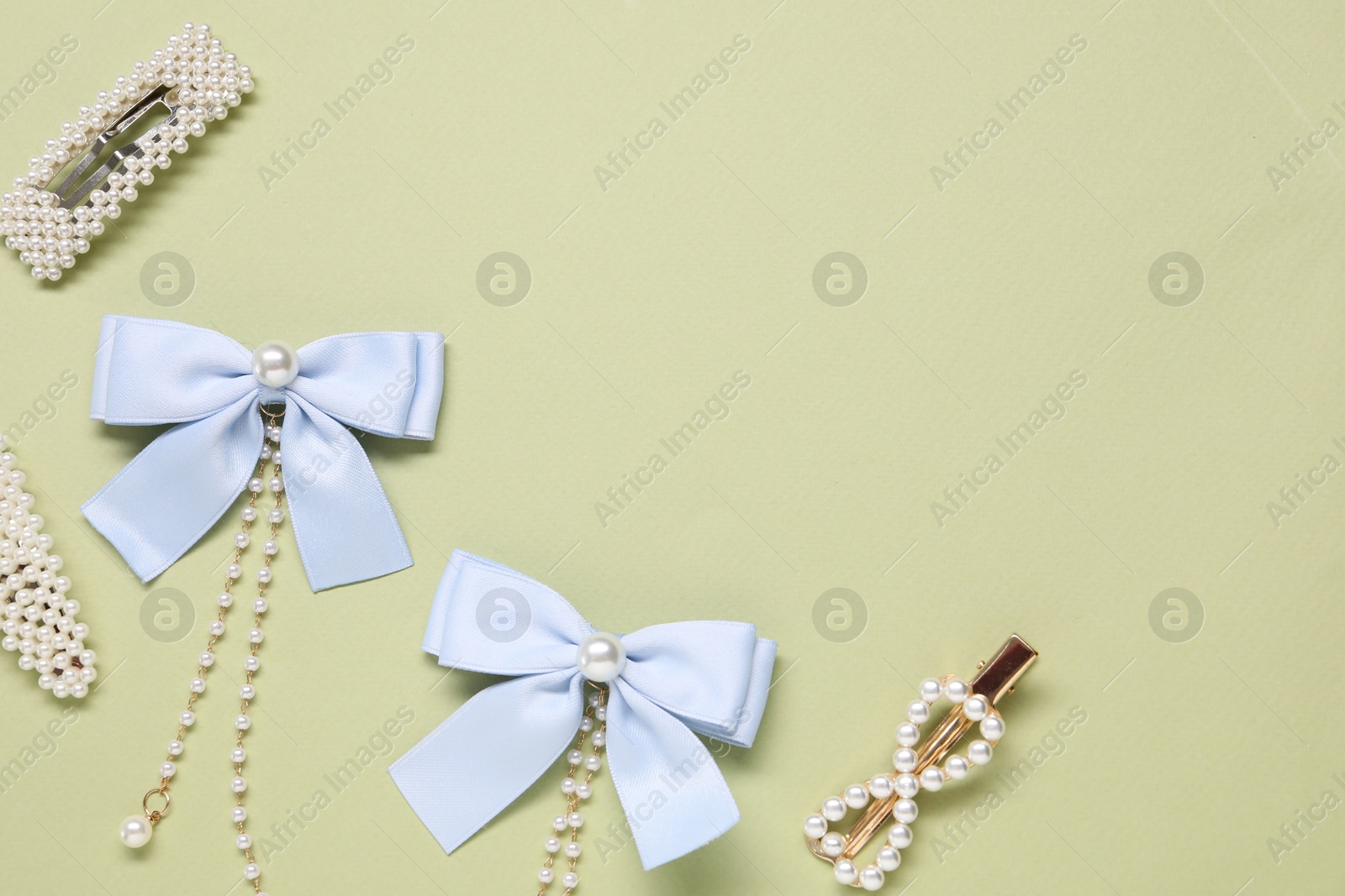 Photo of Cute hair accessories on color background, flat lay. Space for text