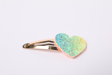 Photo of Cute hair clip with heart on white background