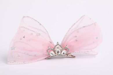 Photo of Cute hair clip with bow and diadem on white background