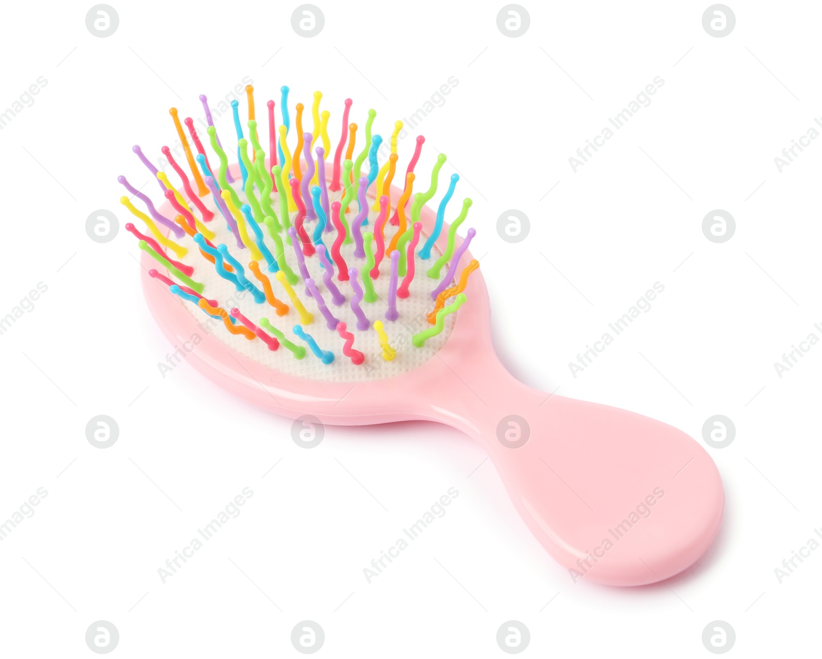 Photo of One colorful hair brush isolated on white