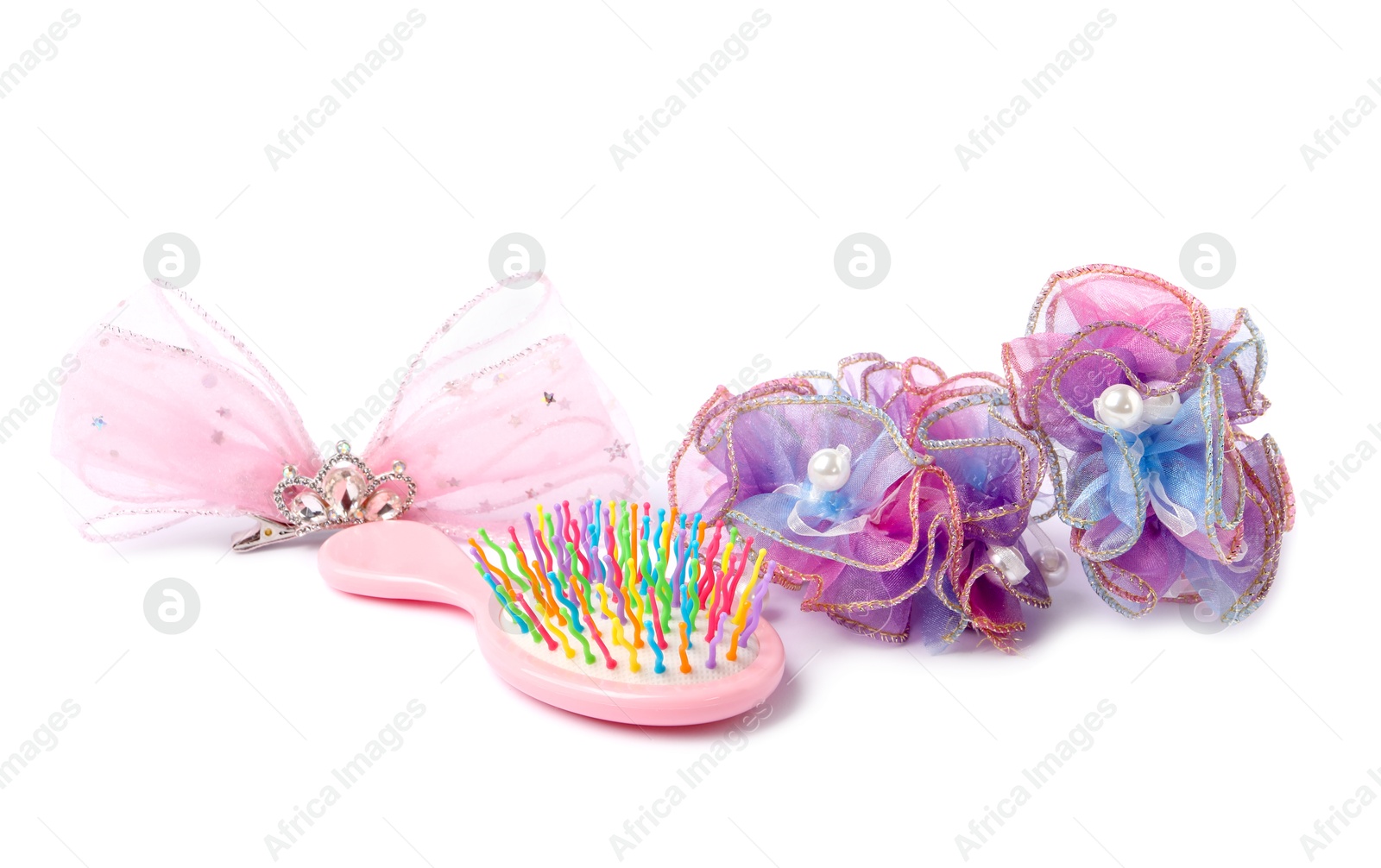 Photo of Colorful cute hair accessories isolated on white