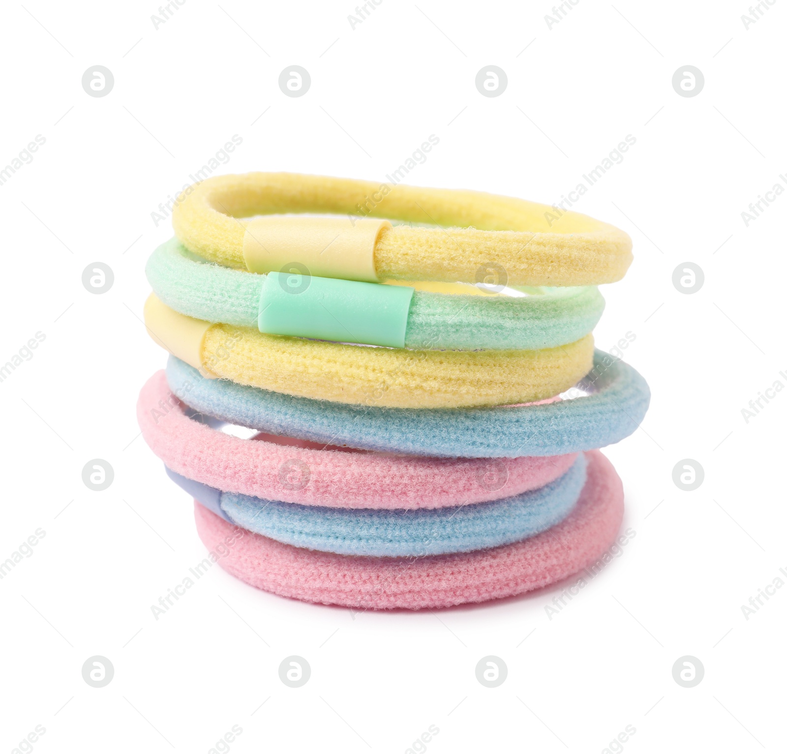 Photo of Stack of colorful hair ties isolated on white