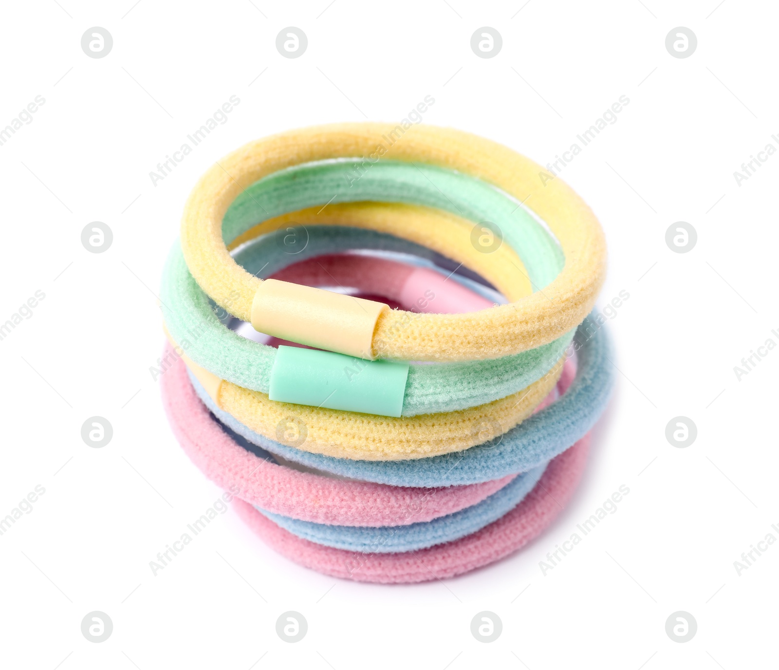 Photo of Stack of colorful hair ties isolated on white