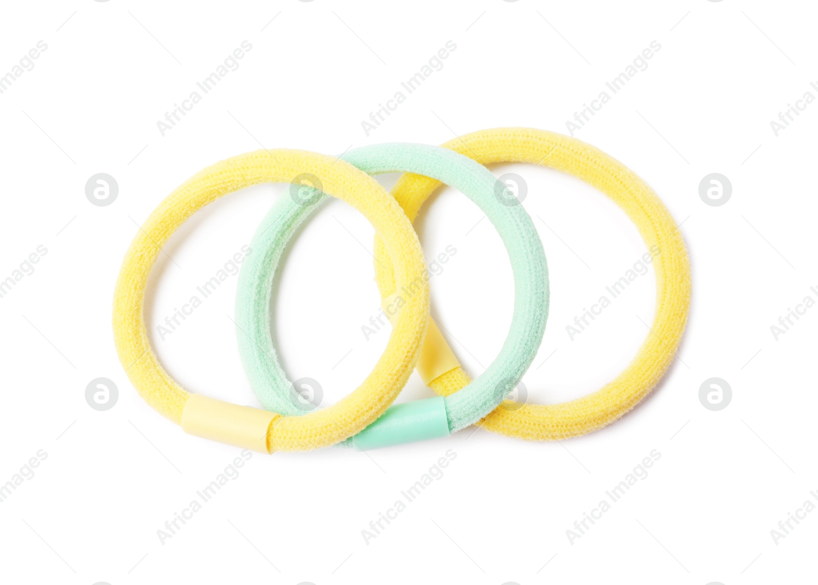 Photo of Many colorful hair ties isolated on white, top view