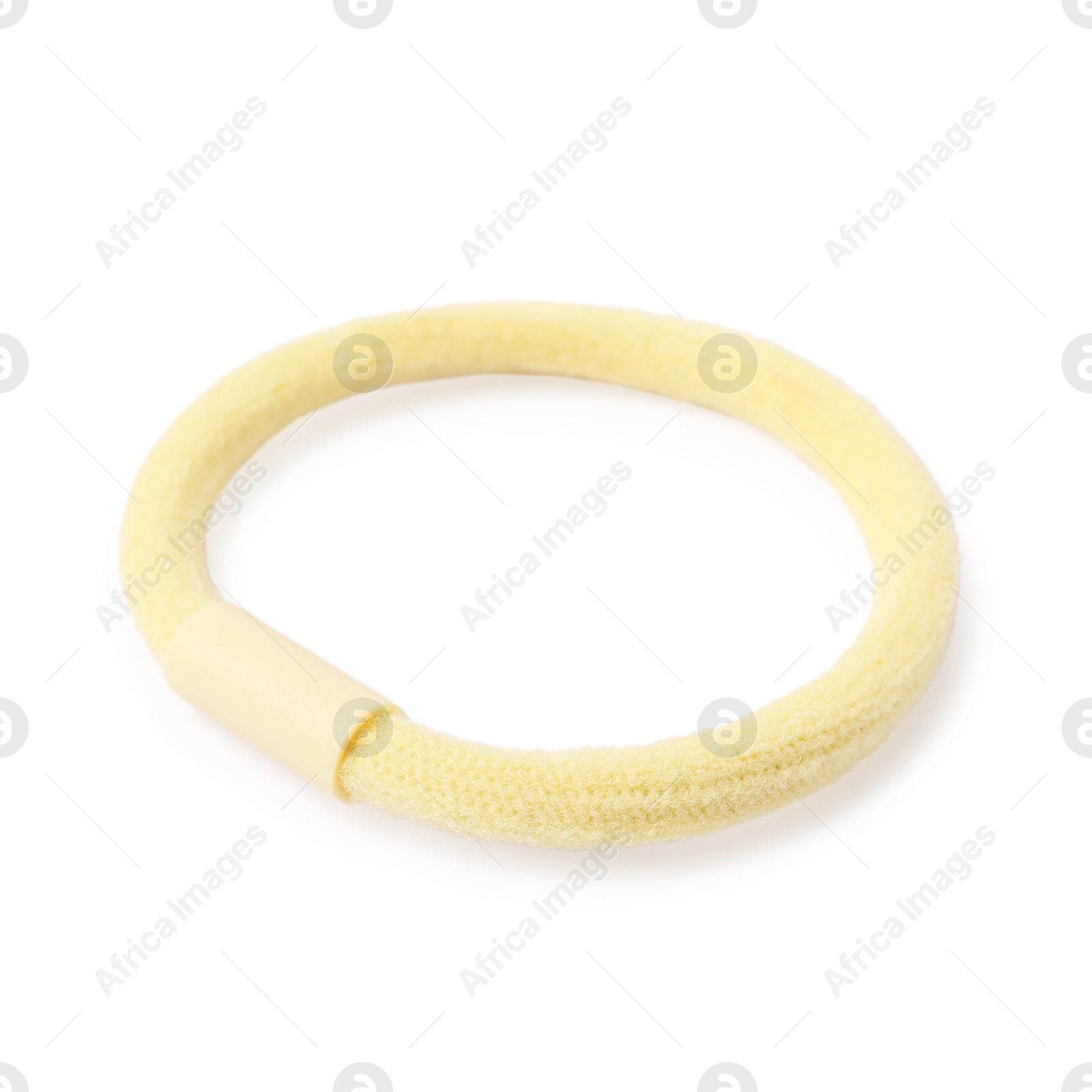 Photo of One yellow hair tie isolated on white