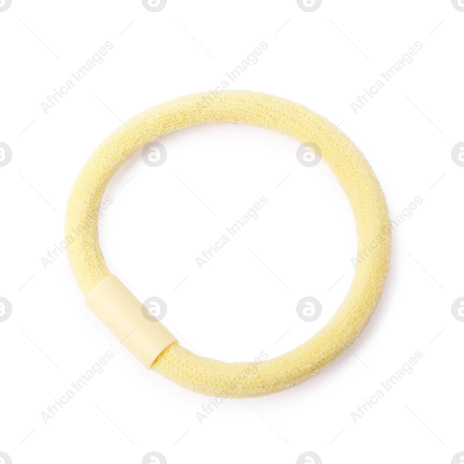 Photo of One yellow hair tie isolated on white, top view