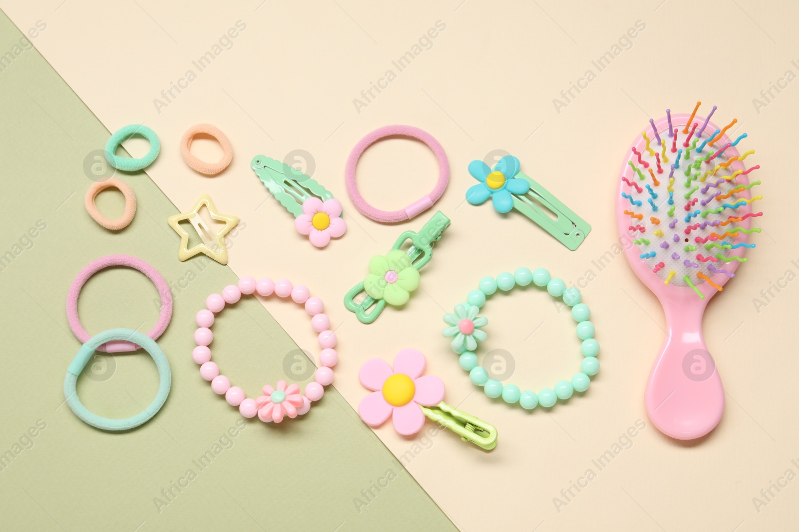 Photo of Cute hair accessories on color background, flat lay