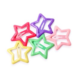 Photo of Many colorful star shaped hair clips isolated on white, top view