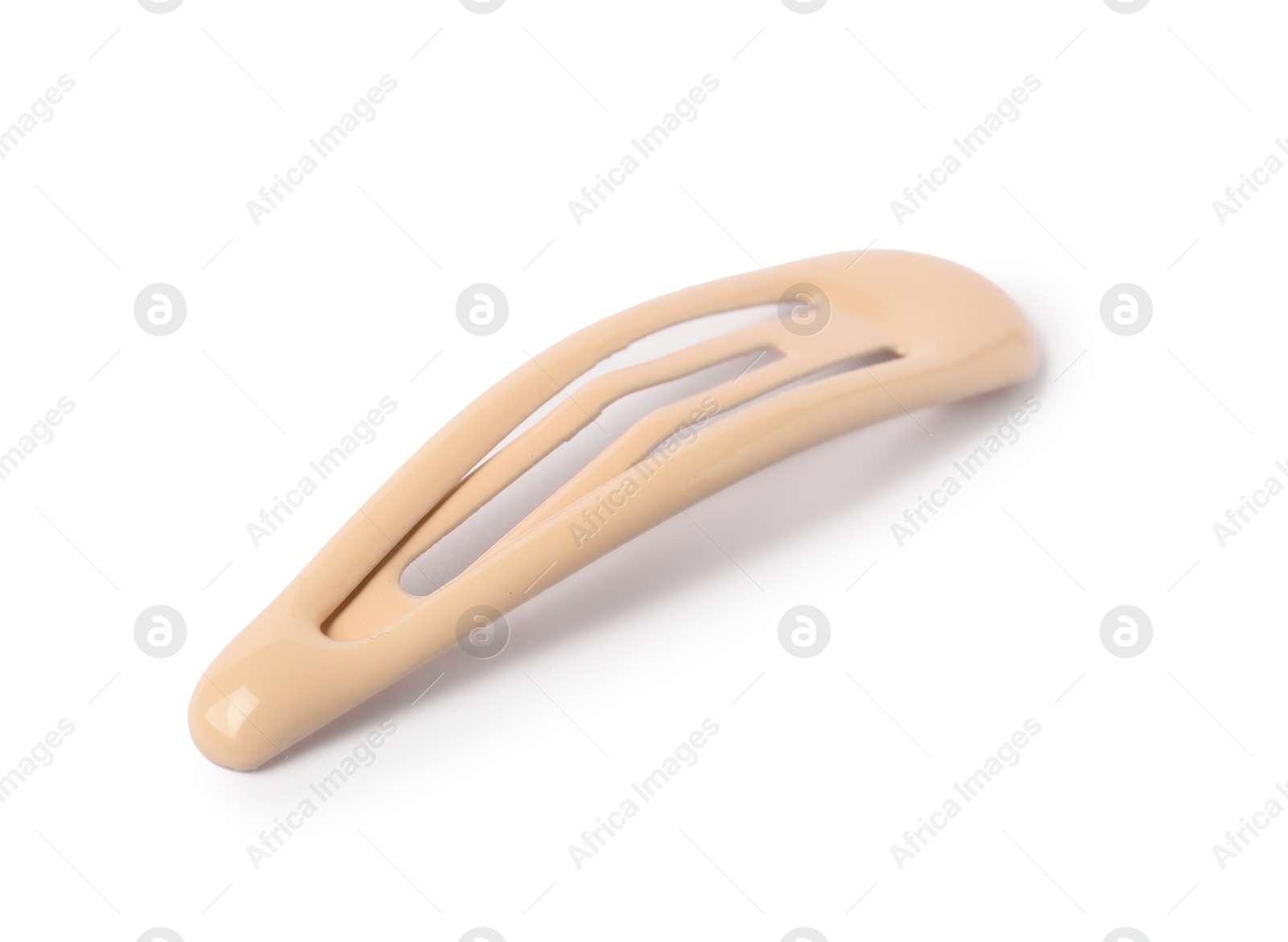 Photo of One beige hair clip isolated on white