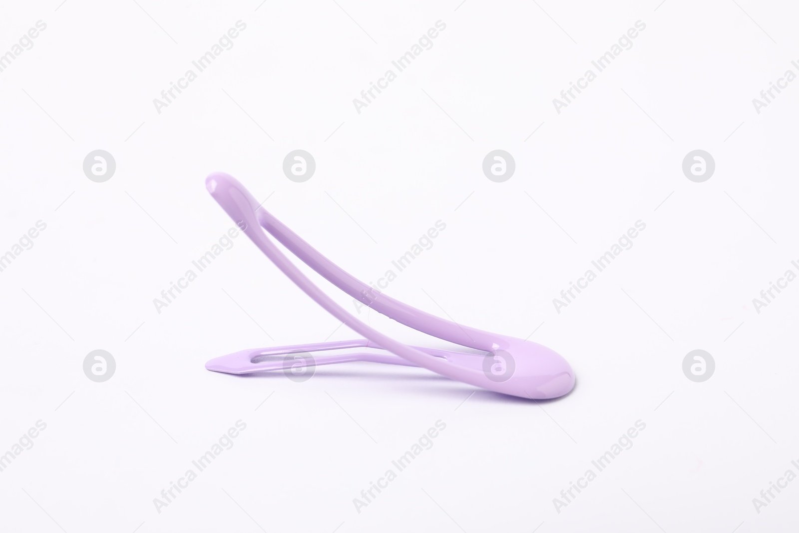 Photo of One lilac hair clip on white background