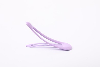 Photo of One lilac hair clip on white background