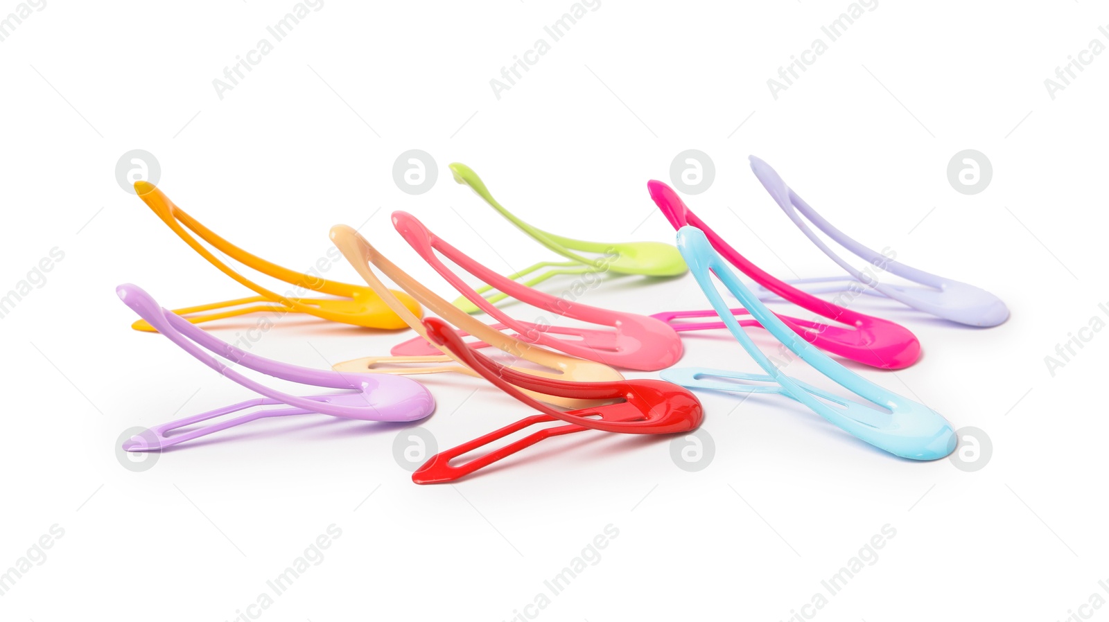 Photo of Many colorful hair clips isolated on white