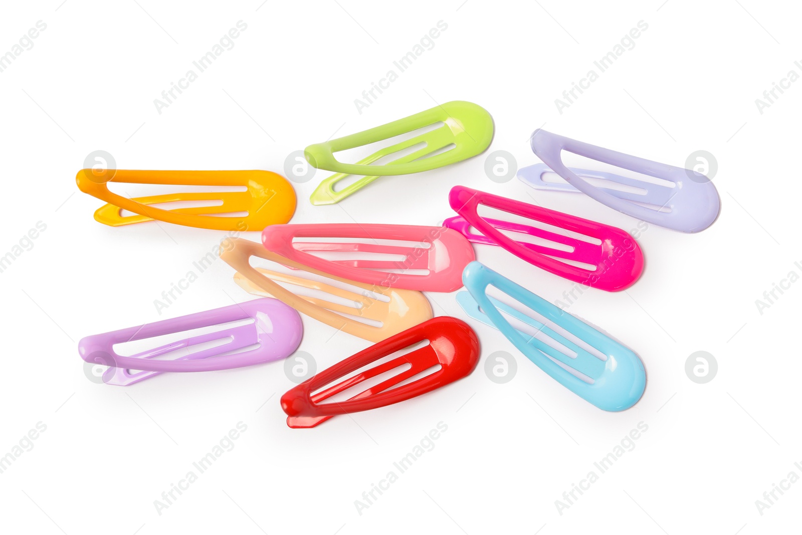 Photo of Many colorful hair clips isolated on white