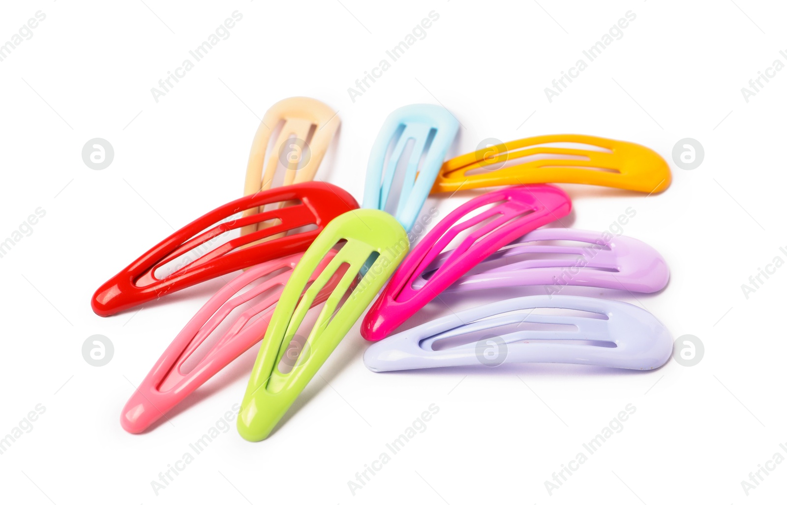 Photo of Many colorful hair clips isolated on white