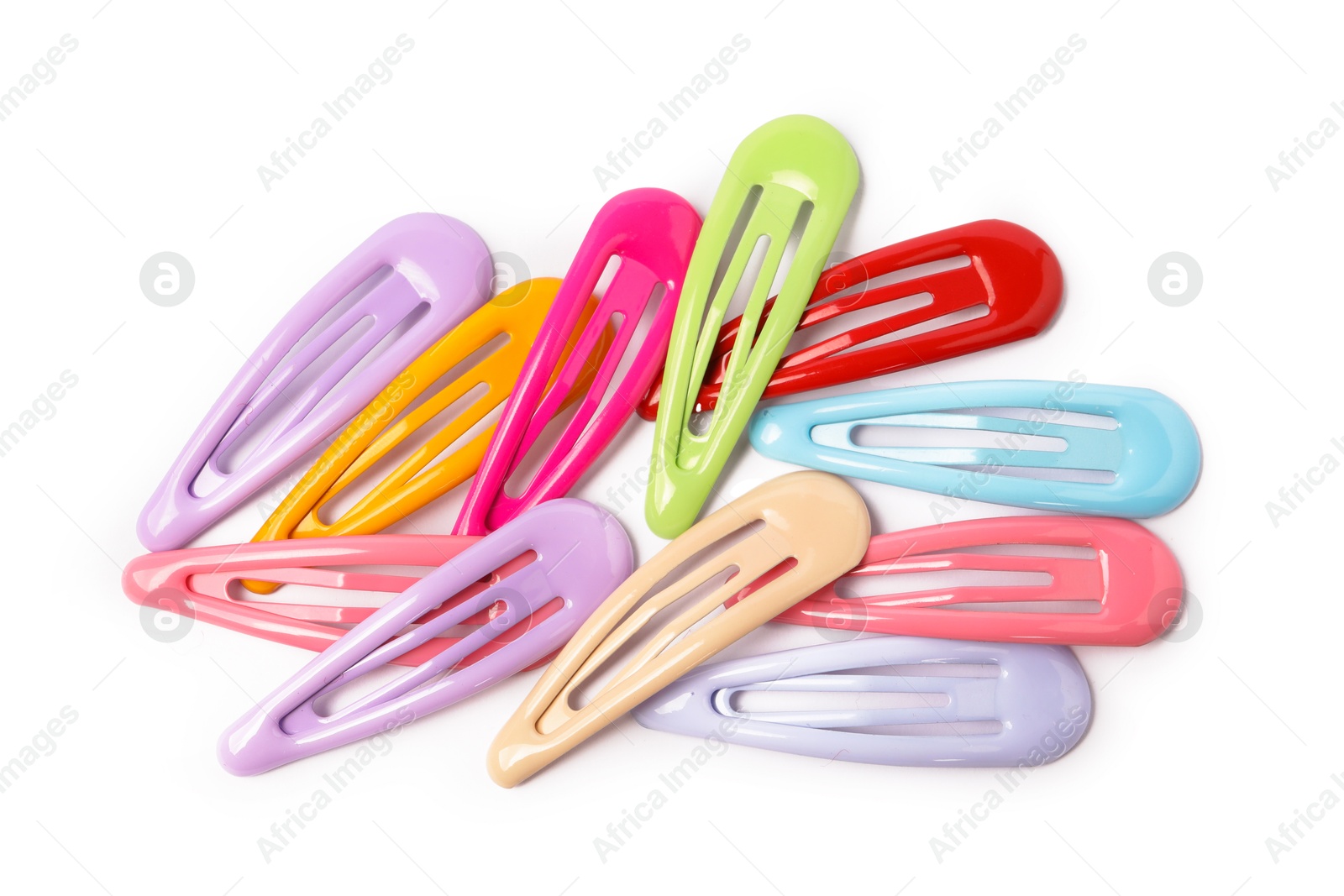 Photo of Many colorful hair clips isolated on white, top view