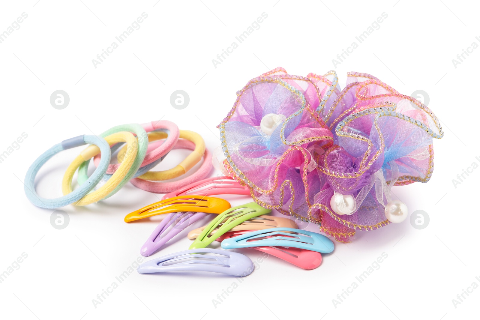 Photo of Colorful cute hair accessories isolated on white