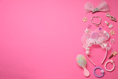 Photo of Cute hair accessories on pink background, flat lay. Space for text