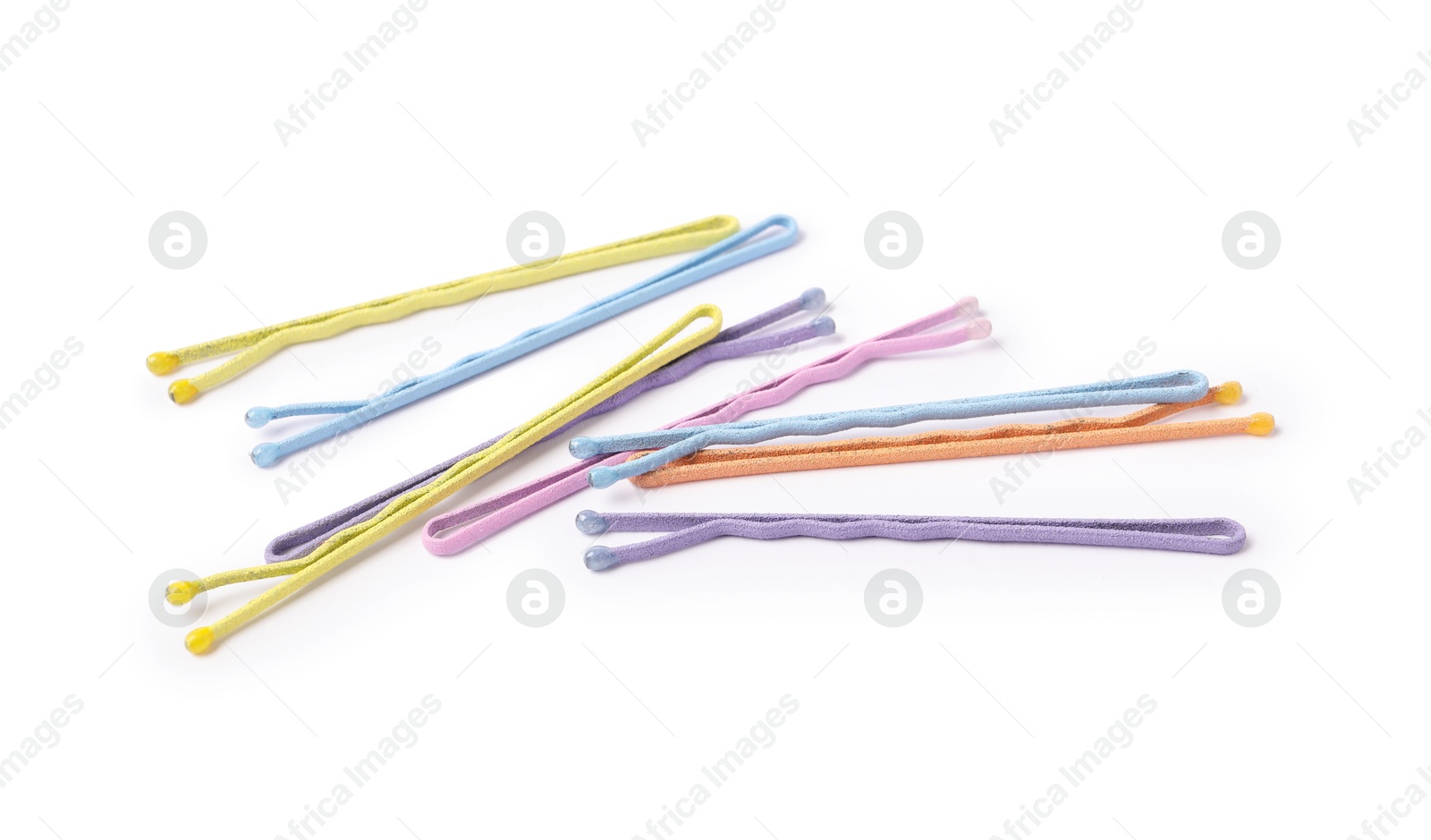 Photo of Many colorful hair pins isolated on white