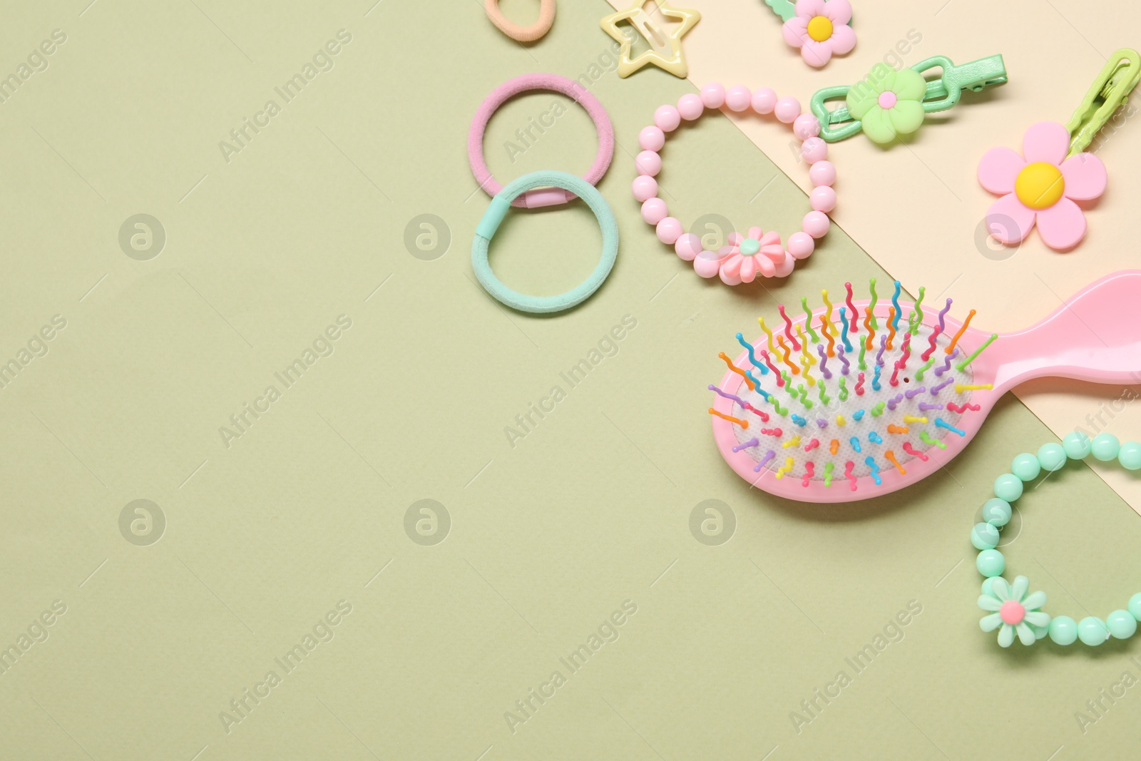 Photo of Cute hair accessories on color background, flat lay. Space for text