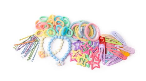 Photo of Colorful cute hair accessories isolated on white, top view