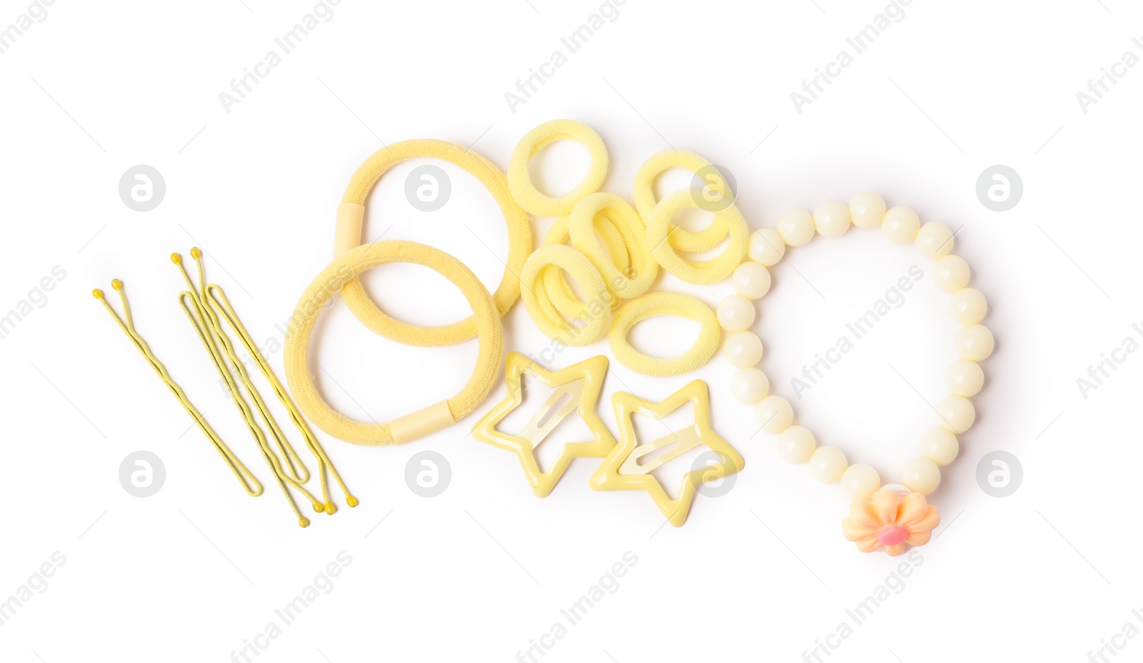 Photo of Yellow cute hair accessories isolated on white, top view