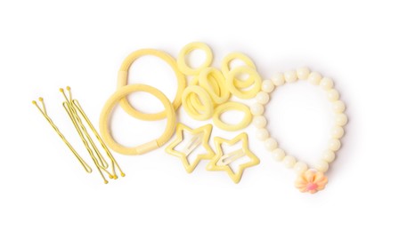 Photo of Yellow cute hair accessories isolated on white, top view