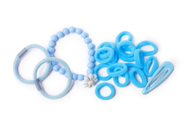 Photo of Blue cute hair accessories isolated on white, top view