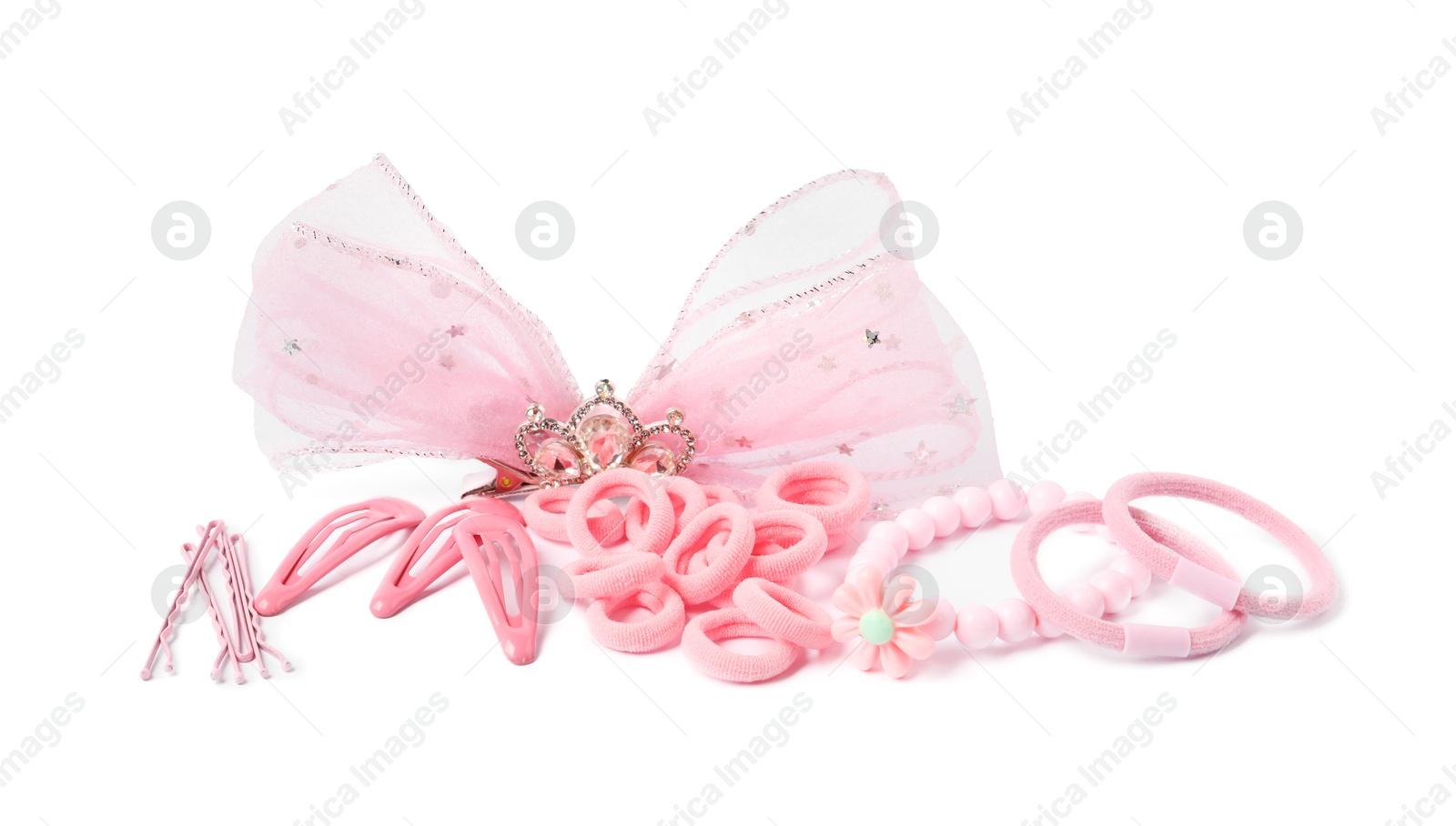 Photo of Pink cute hair accessories isolated on white