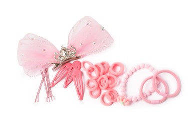 Photo of Pink cute hair accessories isolated on white, top view