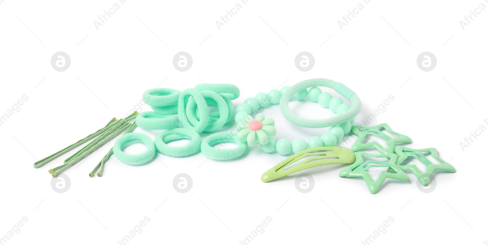 Photo of Green cute hair accessories isolated on white