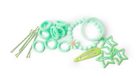 Photo of Green cute hair accessories isolated on white, top view