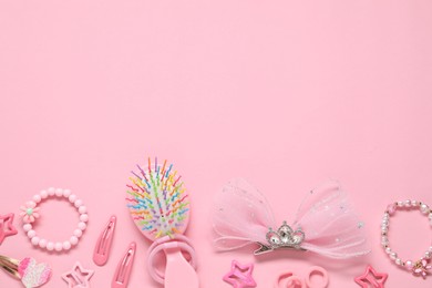 Photo of Cute hair accessories on pink background, flat lay. Space for text