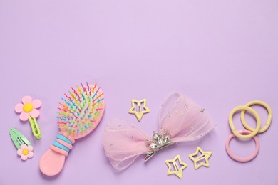 Photo of Cute hair accessories on lilac background, flat lay. Space for text