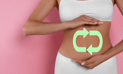 Image of Woman with healthy digestion on pink background, closeup. Arrows symbolizing proper functioning of digestive tract