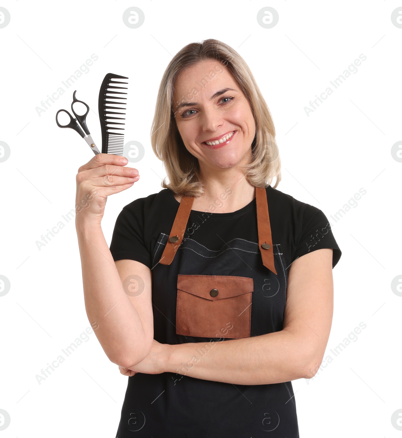 Photo of Smiling hairdresser with comb and scissors on white background