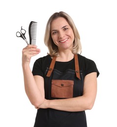 Photo of Smiling hairdresser with comb and scissors on white background