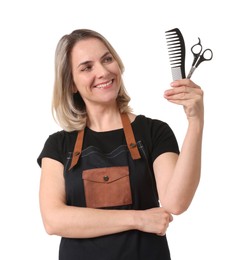 Photo of Smiling hairdresser with comb and scissors on white background