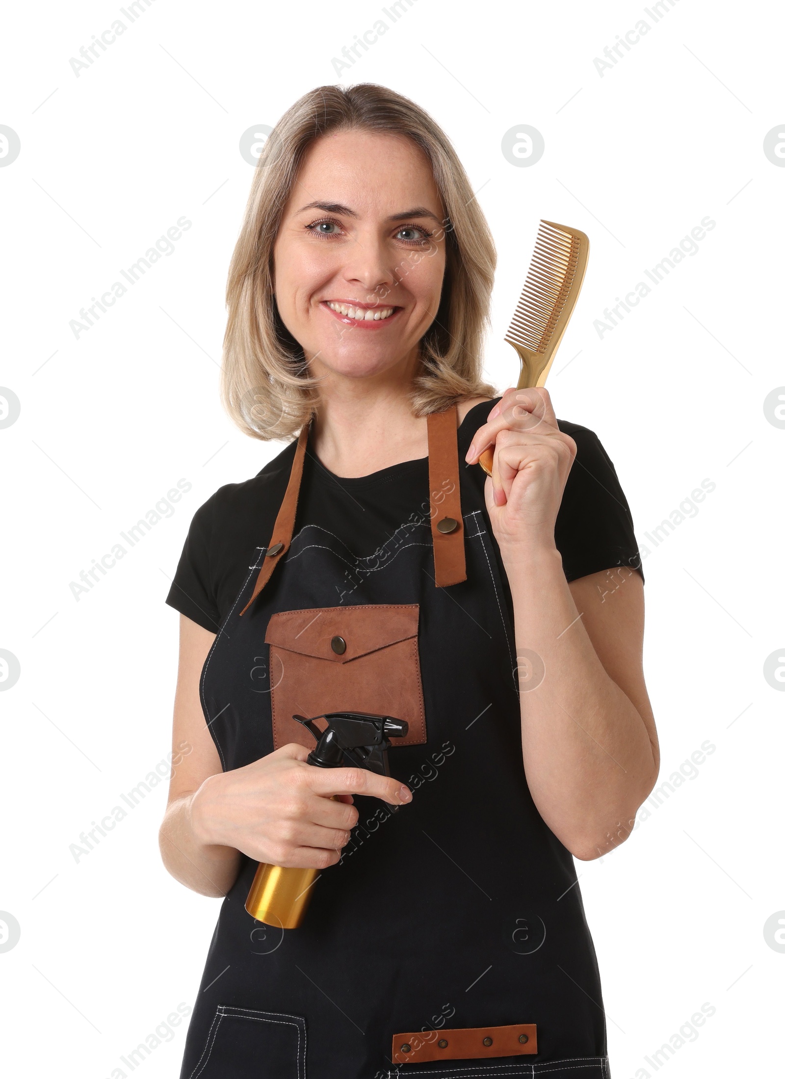 Photo of Smiling hairdresser with comb and spray bottle on white background