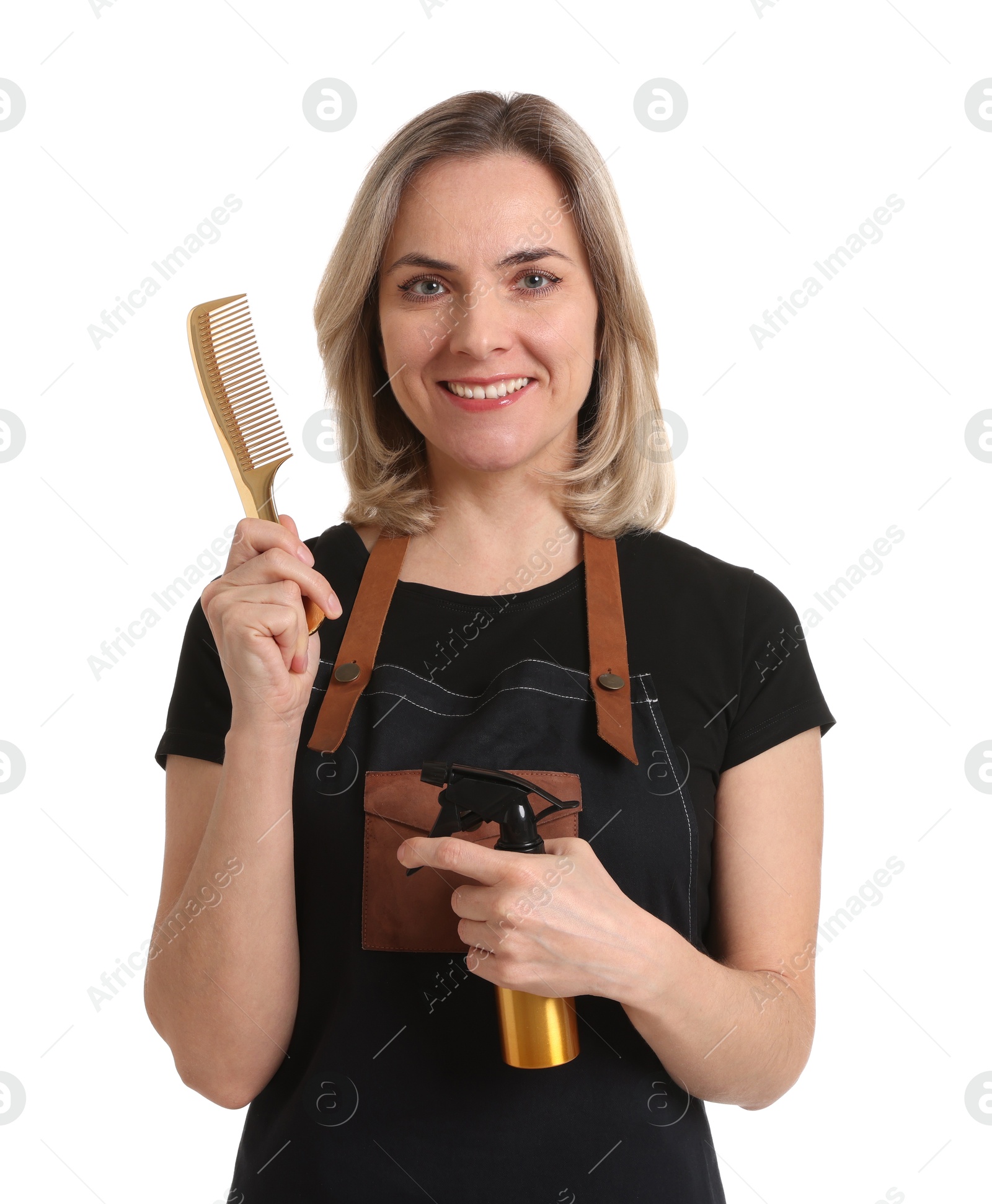 Photo of Smiling hairdresser with comb and spray bottle on white background