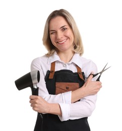 Photo of Smiling hairdresser with dryer and scissors on white background