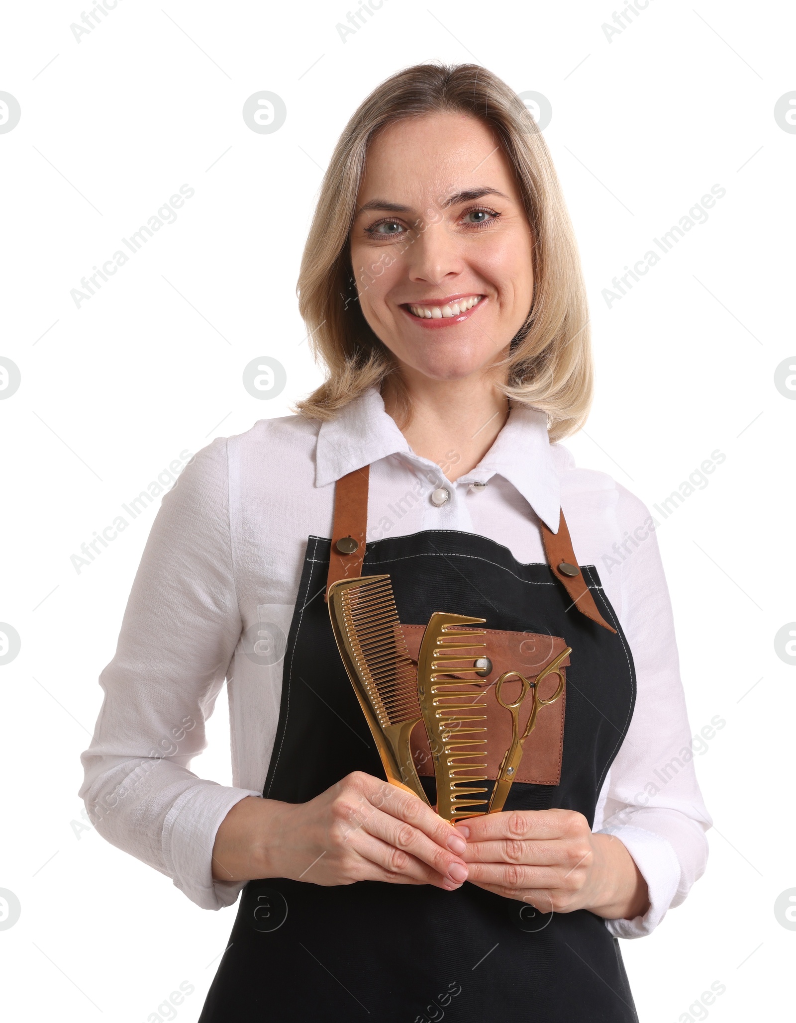 Photo of Smiling hairdresser with combs and scissors on white background