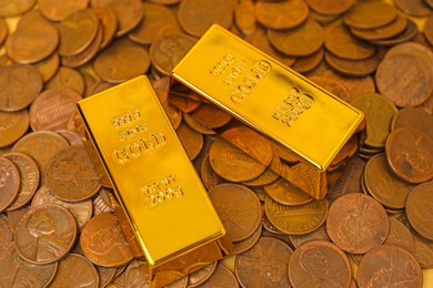 Photo of Gold bars and coins as background, closeup