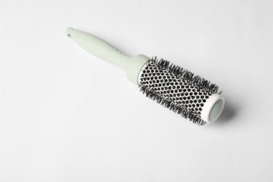 Photo of Hairdresser tool. Round brush on white background