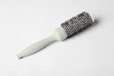 Photo of Hairdresser tool. Round brush on white background