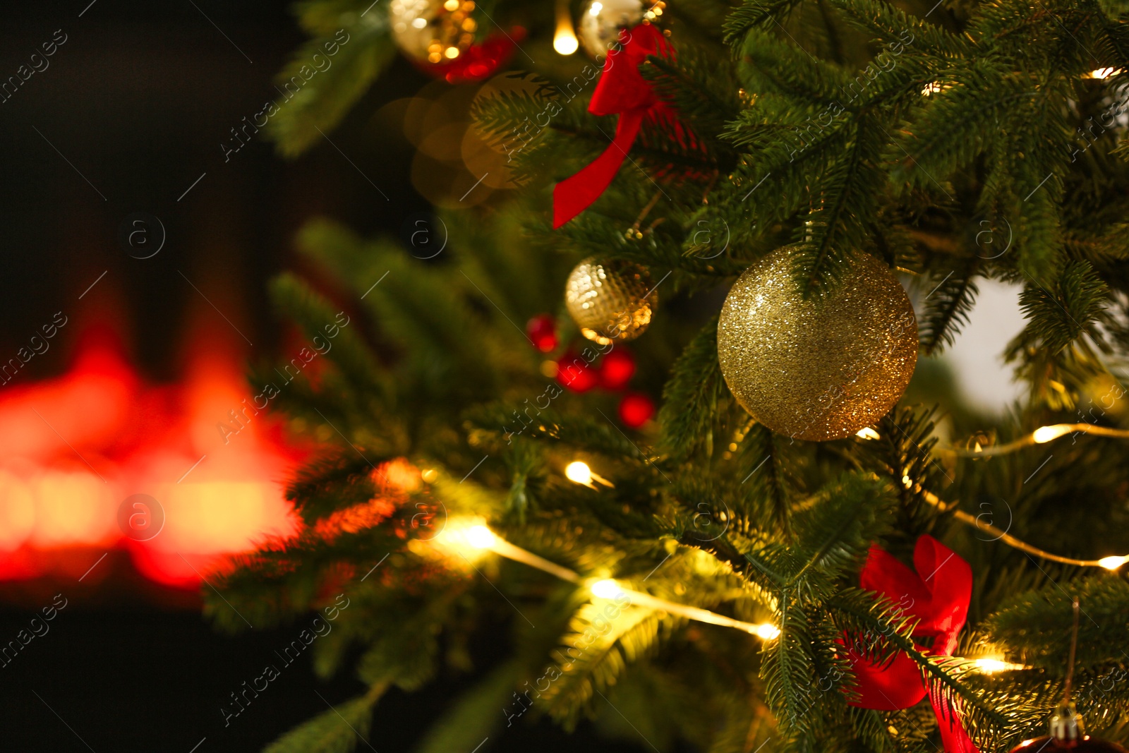 Photo of Beautiful decorated Christmas tree indoors, closeup. Space for text