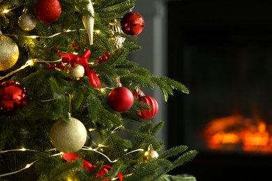 Photo of Beautiful decorated Christmas tree indoors, closeup. Space for text